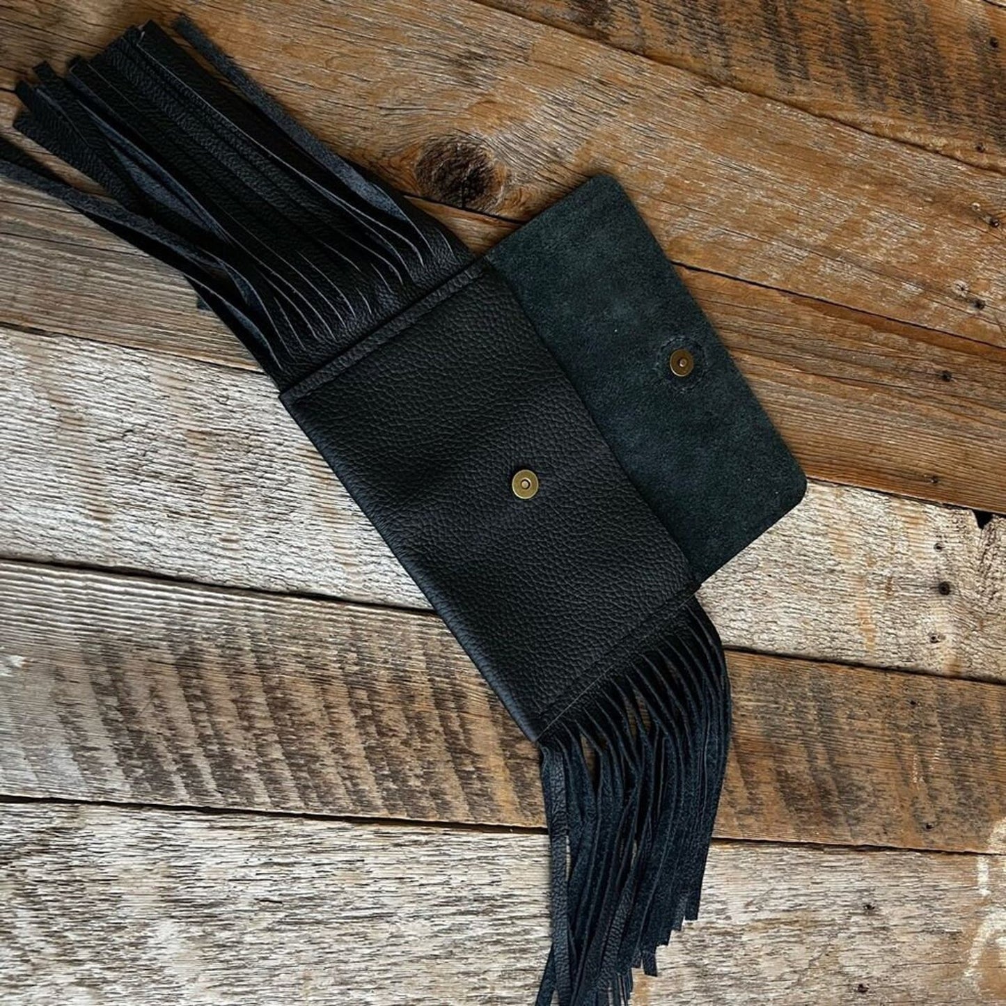 Sleek and Chic: Handcrafted Black Leather Fringe Clutch